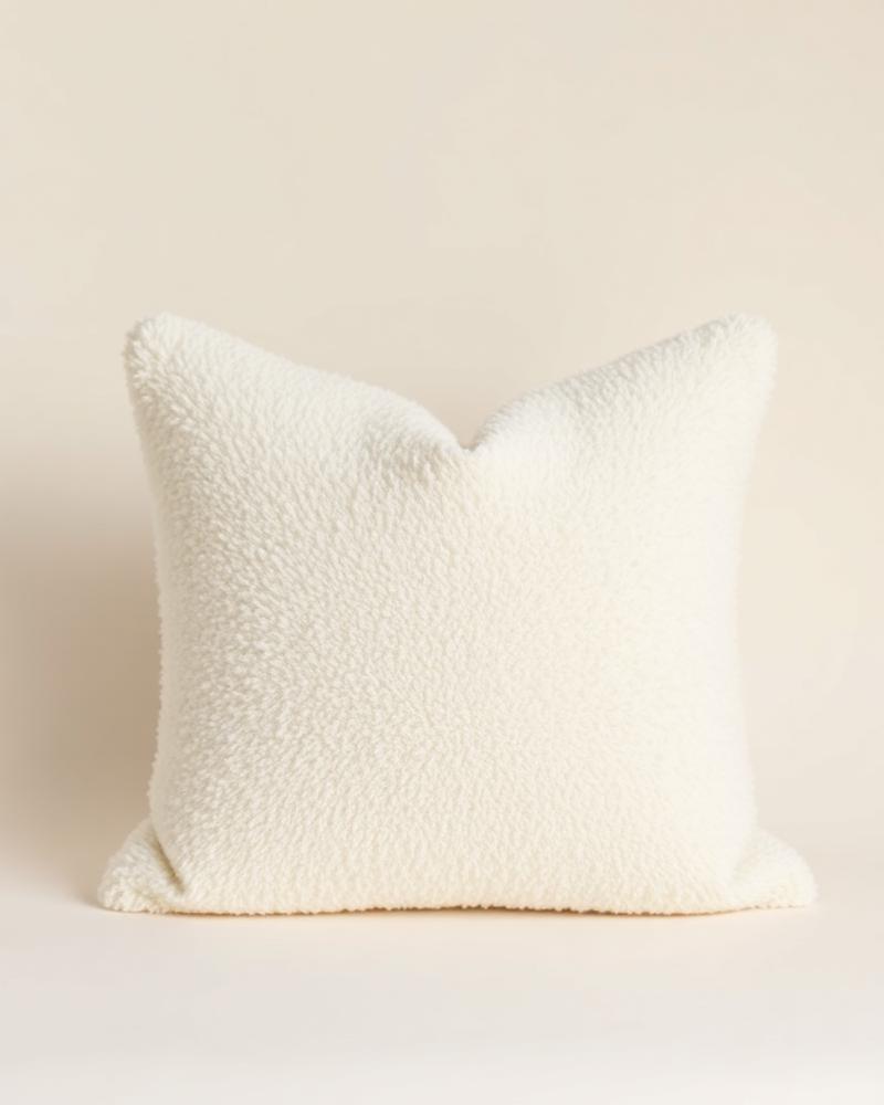 Alpina ivory bouclé throw pillow