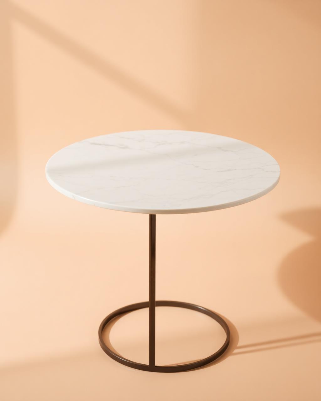 Ceres round marble side table with a slim metal base